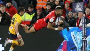 Toulouse's French wing Matthis Lebel dives over the line to score a try during the European Rugby Champions Cup pool 2 rugby union match between Ulster and Toulouse at the Kingspan Stadium in Belfast, on January 13, 2024.