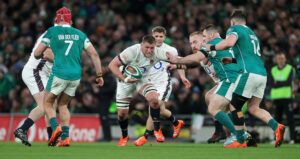 England’s Tom Willis runs through a group of Ireland players in the February 2025 Six Nations match.