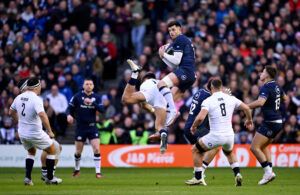 Scotland’s Blair Kinghorn jumps for the ball in the 2024 Calcutta Cup match against England.