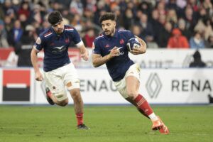 France’s Romain Ntamack runs with the ball during his team’s January 2025 Six Nations match against Wales.