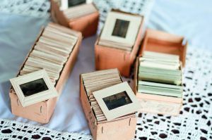 Boxes of old slides and cine film in cardboard boxes