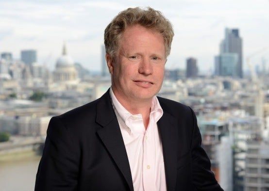 Former ITV director of news and current affairs Michael Jermey in front of London skyline backdrop