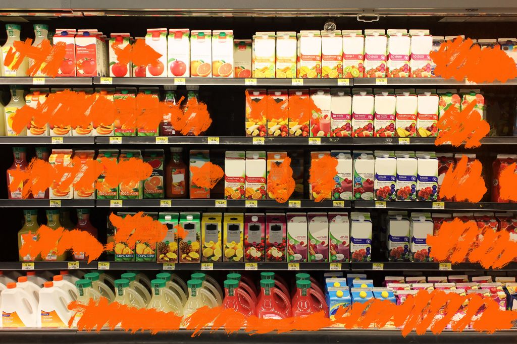 A photo illustration of the juice section of a grocery store. Several of the labels are scribbled out in orange