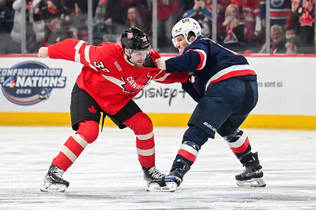 Canada's Brandon Hagel fights with United States' Matthew Tkachuk during the 4 Nations Face-Off tournament in Montreal.