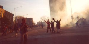 Protesters engulfed by tear gas during Summit of the Americas protests and demonstrations in Quebec City.