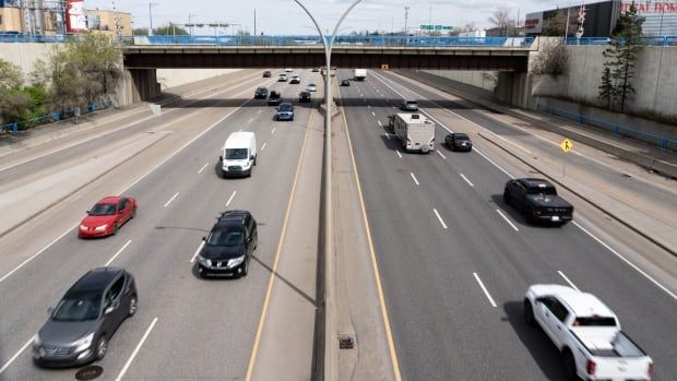 Cars are seen driving in opposite directions on a freeway in Edmonton.