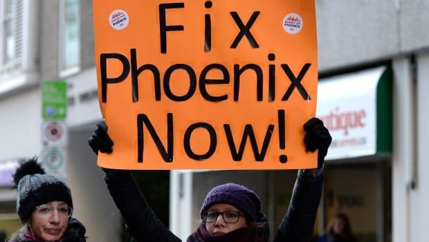 Members of the Public Service Alliance of Canada affected by the Phoenix pay system rally during a protest on the three year anniversary of the launch of the pay system, in Ottawa on Thursday, Feb. 28, 2019. More than 98-thousand civil servants may still owe the federal government money from being overpaid through the disastrous Phoenix pay system.