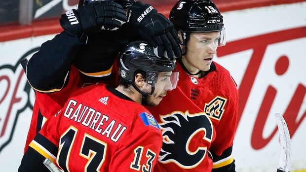 Calgary Flames' Johnny Gaudreau celebrates his goal with then-teammate Matthew Tkachuk during an NHL game on April 24, 2021 