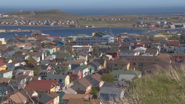 A view of the colourful houses of St-Pierre on a sunny summer day.