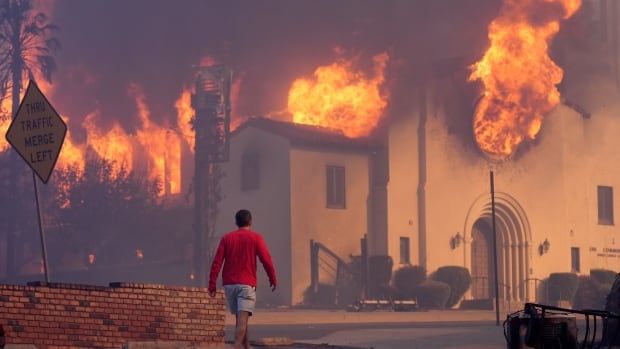 A church is burning in a wildfire.