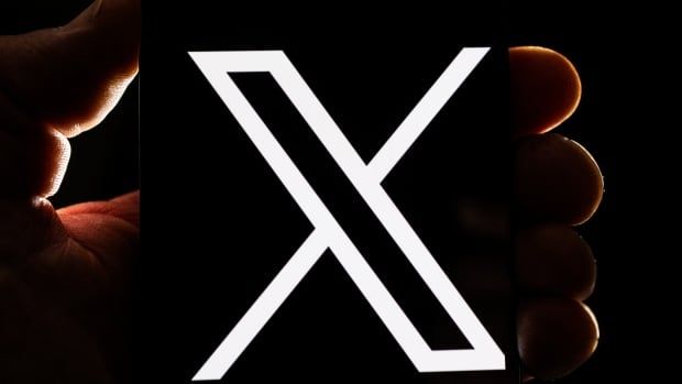 An image of the logo for social media site X, which is a white X. 