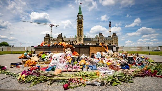 A memorial set up on June 2, 2021 in recognition of possible unmarked graves at the site of a former residential school in Kamloops, B.C.