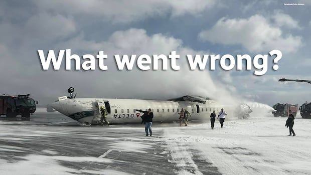 Passengers escape from a Delta plane following a crash at Pearson airport