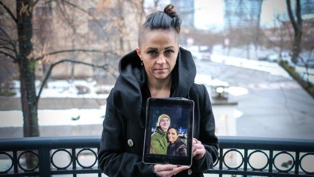 Andelaine Nelson displays a photo of her son, Laken Pavan. The now 18-year-old was recruited as a spy by Russian agents, in the spring of 2024. He pleaded guilty to espionage charges in Poland and is serving a 20-month jail sentence.