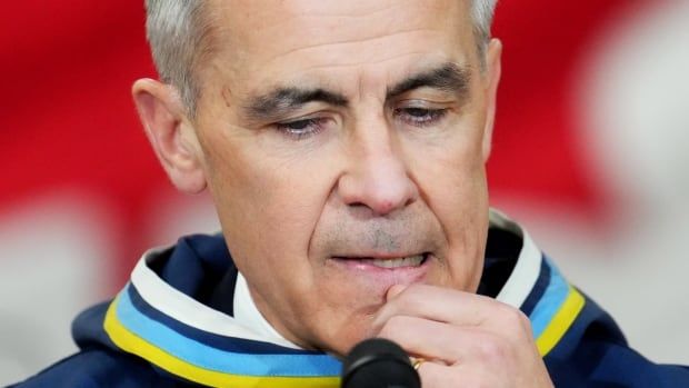 Prime Minister Mark Carney responds to questions from the media as he makes an announcement at a Canadian Armed Forces forward-operating location in Iqaluit, Nunavut, on Tuesday, March 18, 2025.