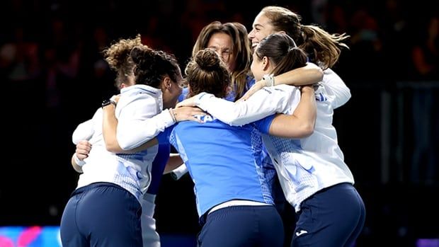 Team Italy celebrates after winning the final tie against Slovakia at the Billie Jean King Cup Finals at on Nov. 20, 2024 in Malaga, Spain. 