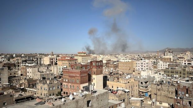 Smoke rises after U.S. strikes in Sanaa, Yemen.