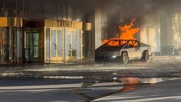 Flames rise from a Tesla Cybertruck after it exploded outside the Trump International Hotel Las Vegas.