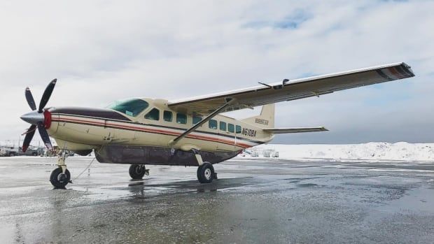 A small airplane is shown on the ground.