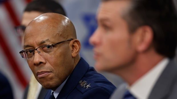 CQ Brown looking toward Pete Hegseth, during a meeting at the Pentagon.