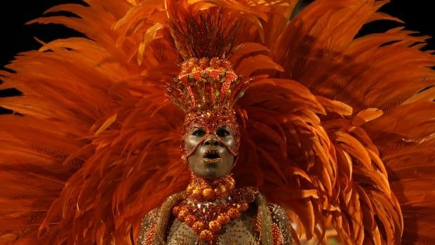 A woman dressed in costume performing during the Carnival in Rio de Janeiro 