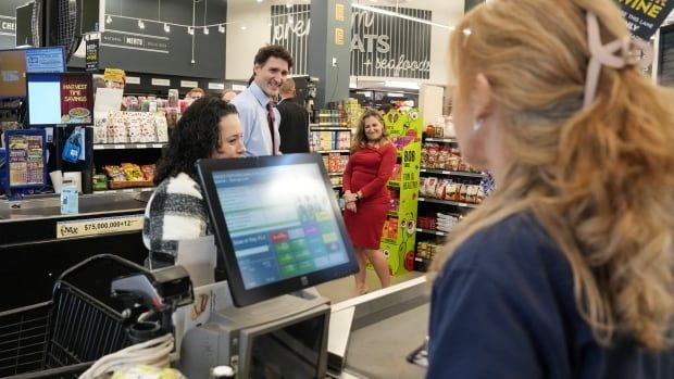 Prime Minister Justin Trudeau and Deputy Prime Minister Chrystia Freeland visit Vince’s Market, a grocery store in Sharon, Ontario, on Nov. 21. The government on Thursday announced a sweeping promise to make goods like groceries, children's clothing, Christmas trees and restaurant meals free from GST/HST between Dec. 14 and Feb. 15.