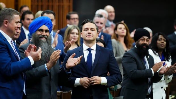 Conservative Leader Pierre Poilievre is given a standing ovation by his party as he rises to answer a question during question period in the House of Commons on Parliament Hill in Ottawa on Monday, Sept. 18, 2023. MPs returned today following the summer recess.