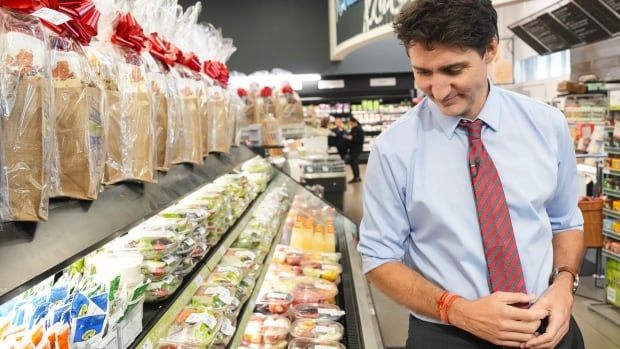 Prime Minister Justin Trudeau visits Vince’s Market, a grocery store in Sharon, Ontario, on Thursday November 21, 2024. The government on Thursday announced a sweeping promise to make goods like groceries, children's clothing, Christmas trees and restaurant meals free from GST/HST between Dec. 14 and Feb. 15. 