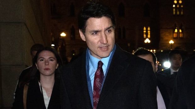 Prime Minister Justin Trudeau makes his to a national caucus meeting, in Ottawa, Monday, Dec. 16, 2024.