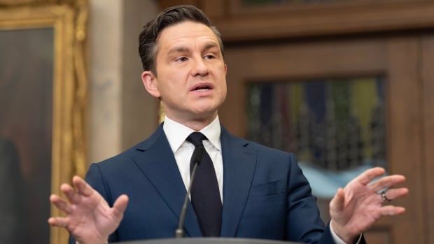 Leader of the Conservative Party Pierre Poilievre speaks with reporters in the Foyer of the House of Commons, in Ottawa, Monday, Dec. 16, 2024.