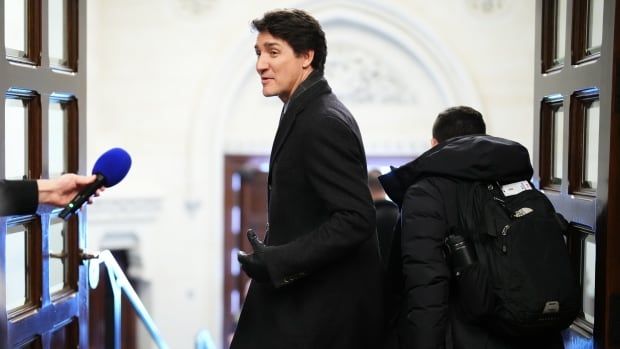 Prime Minister Justin Trudeau leaves a Liberal caucus meeting in Ottawa on Wednesday, Jan.8, 2025.