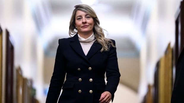 Minister of Foreign Affairs Melanie Joly returns to a Liberal Party caucus meeting in West Block on Parliament Hill, in Ottawa, Wednesday, Jan. 8, 2025. THE CANADIAN PRESS/Justin Tang