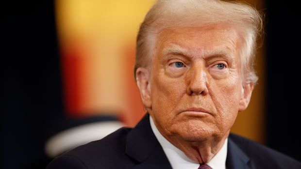 President-elect Donald Trump looks on as he arrives for the 60th Presidential Inauguration in the Rotunda of the U.S. Capitol in Washington.