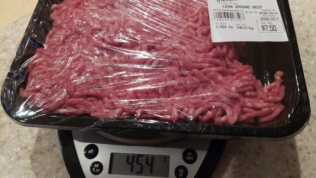 A package of ground beef on a scale.