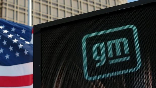 FILE PHOTO: The new GM logo is seen on the facade of the General Motors headquarters in Detroit, Michigan, U.S., March 16, 2021. Picture taken March 16, 2021.  REUTERS/Rebecca Cook/File Photo