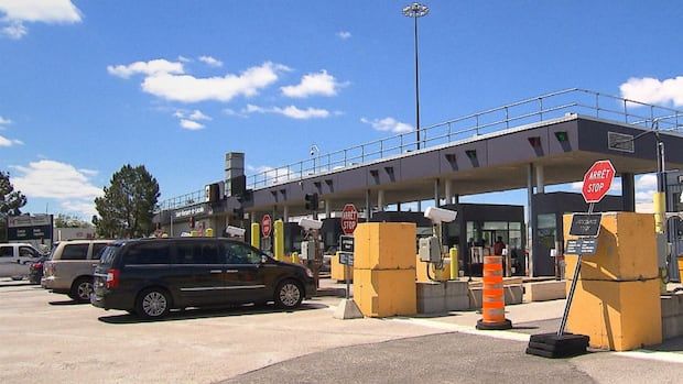 Cars waiting to get back into Canada at Saint-Bernard-de-Lacolle border crossing.