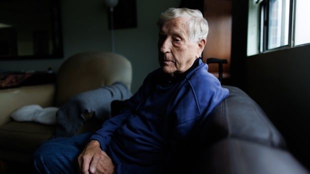 John Scully, one of the plaintiffs in a court challenge that argues that it is discriminatory to bar people with mental disorders from being eligible for medical assistance in dying, poses for a portrait in his Toronto home, Monday, Aug. 19, 2024.