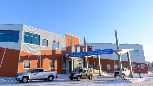 The exterior of a hospital in winter.