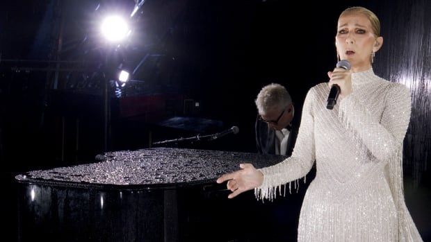 Image shows Canadian Singer Celine Dion performing on the Eiffel Tower during the opening ceremony for the 2024 Summer Olympics in Paris, France.