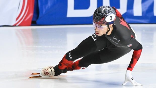 A men's skating competes.