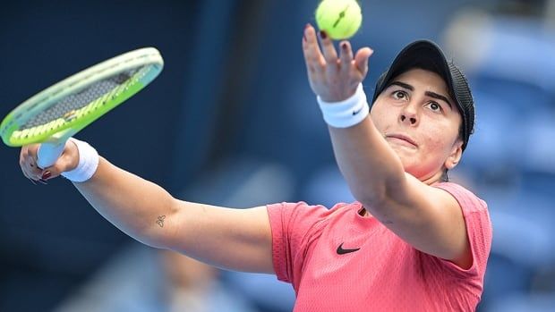 Canadian women's tennis player Bianca Andreescu serves against Britain's Katie Boulter during their singles quarterfinal of the Pan Pacific Open tournament in Tokyo on Oct. 25, 2024. 