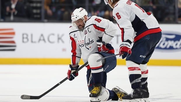 Washington Capitals left-winger Alex Ovechkin kneels on one knee after he was injured on a play against the Utah Hockey Club in the third period on Nov. 18, 2024 at Delta Center in Salt Lake City. 