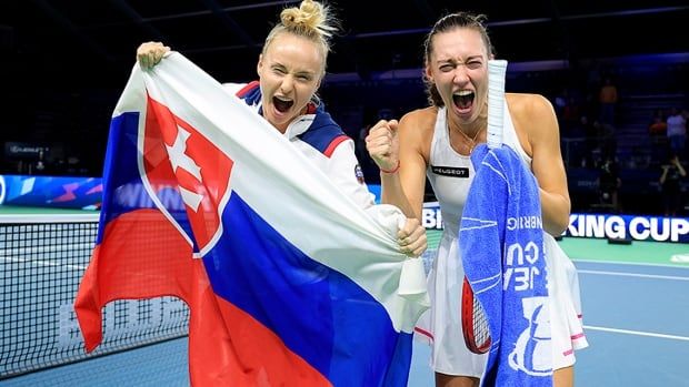 Rebecca Sramkova and Tereza Mihalikova of Slovakia celebrate after prevailing in a semifinal tie against Great Britain at the Billie Jean King Cup Final on Nov. 19, 2024 in Malaga, Spain. 