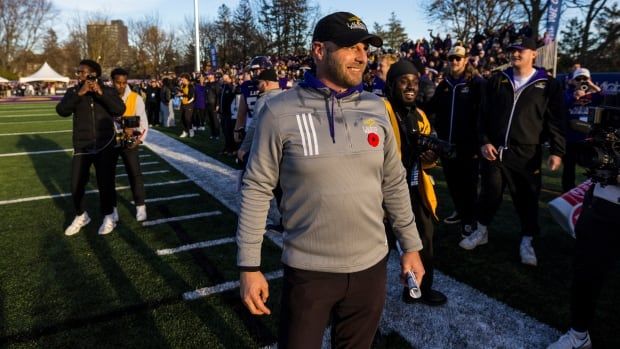 Male Laurier head football coach.