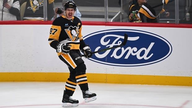 Pittsburgh Penguins male player reacts after scoring his 600th career goal in the second period during the game at PPG PAINTS Arena on November 23, 2024 in Pittsburgh, Pennsylvania.