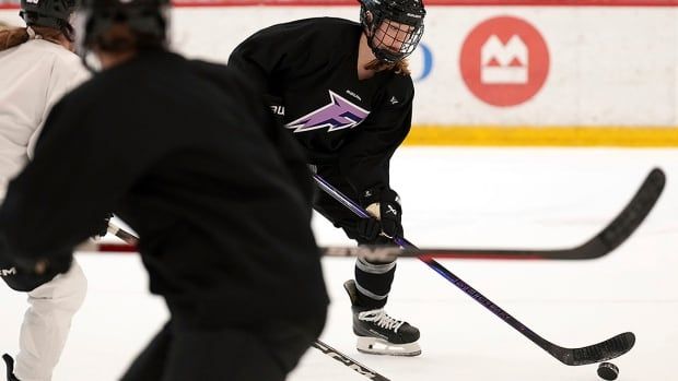 Minnesota Frost defender Claire Thompson controls the puck during a PWHL practice on Nov. 14, 2024 at TRIA Rink in St. Paul, Minnesota.