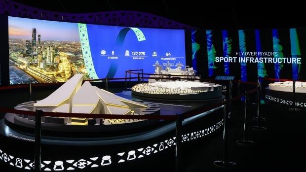 Stadiums models are displayed during a media tour