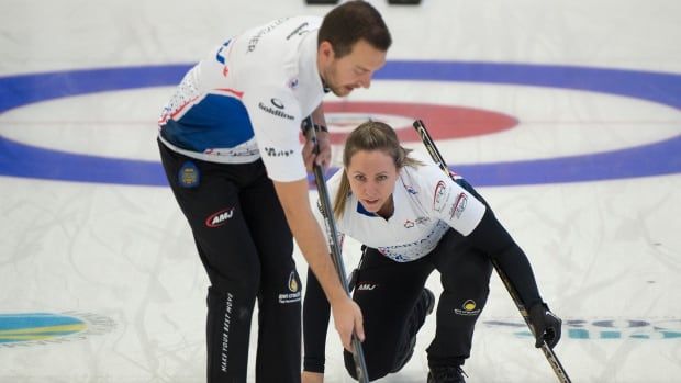 Male and female curlers.