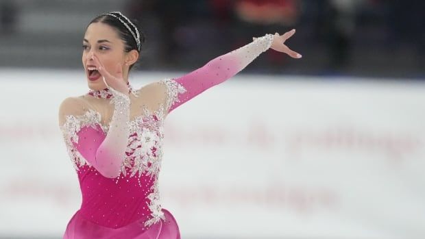 A figure skater competes