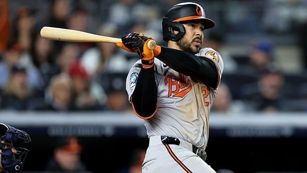 Anthony Santander of the Baltimore Orioles hits an RBI double against the New York Yankees during at Yankee Stadium on September 25, 2024 in the Bronx borough of New York City. 